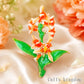 フラワー オレンジ ブローチ 花 植物 リーフ アクセサリー 華やか 上品 ボタニカル かわいい バッグ 帽子 ストール プレゼント ギフト